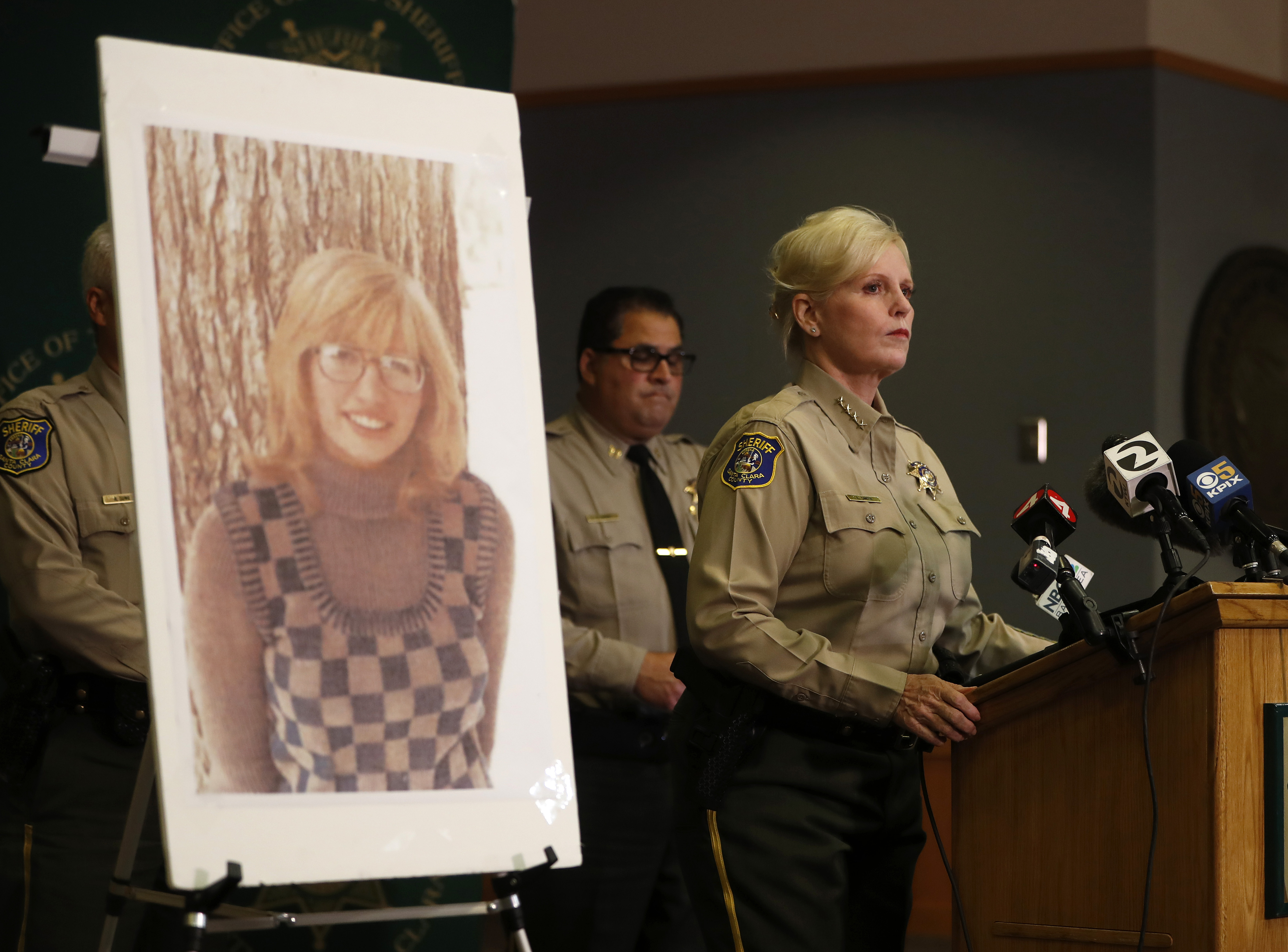 Santa Clara County Sheriff Laurie Smith speaks to the media about the 1974 killing of Arlis Perry, photograph at left, at the Sheriff's office in San Jose, Calif., on Thursday, June 28, 2018.