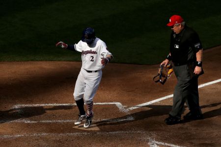 Nate Orf #2 of the Milwaukee Brewers crosses home plate on his home run in the seventh inning against the Minnesota Twins at Miller Park on July 4, 2018 in Milwaukee, Wisconsin. (Photo by Dylan Buell/Getty Images)