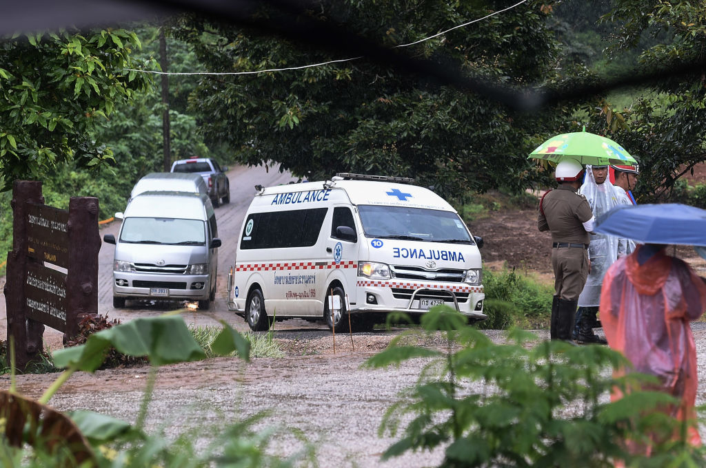 An ambulance leaves from the Tham Luang cave area as the operations continue for those still trapped inside the cave in Khun Nam Nang Non Forest Park in the Mae Sai district of Chiang Rai province on July 10, 2018. (Photo by YE AUNG THU / AFP/Getty Images)
