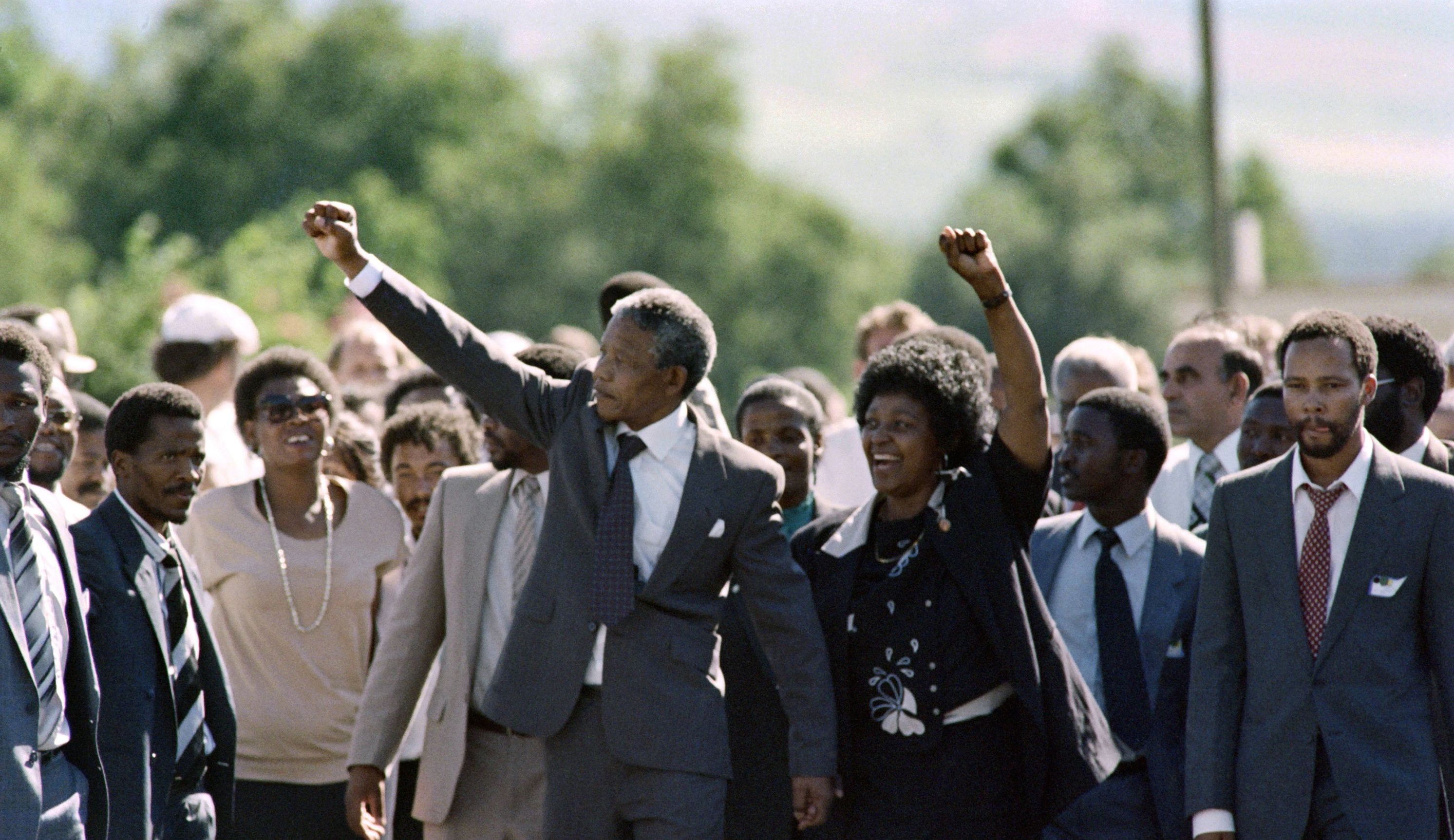 Nelson Mandela and his wife Winnie raise fists upon Mandela's release from Victor Verster prison on February 11, 1990 in Paarl. (ALEXANDER JOE/AFP/Getty Images)