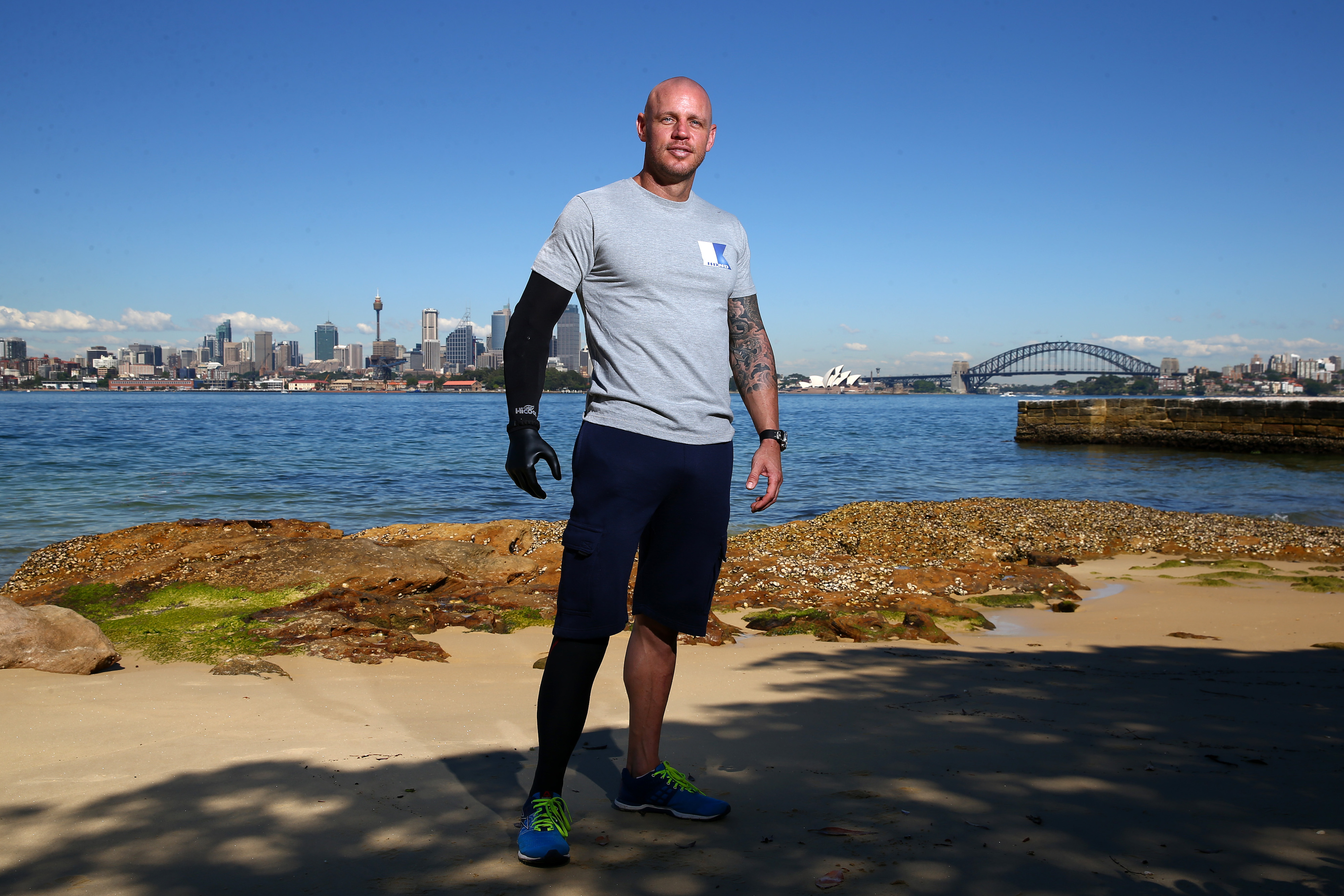 Paul de Gelder, poses on Sydney Harbour on November 13, 2013 in Sydney, Australia. Motivational speaker, author and Navy Reserve, Paul de Gelder, 36, lost both an arm and a leg when he was attacked by a male bull shark during an anti-terrorism exercise working as a Navy Clearance Diver with the Royal Australian Navy in Sydney Harbour in February 2009. De Gelder now travels Australia as a motivational speaker and shares his story to inspire others to overcome adversity. Paul is currently on location in South Australia monitoring the behaviour of Great White Sharks with scientists producing a documentary for Discovery Channel. (Cameron Spencer/Getty Images)