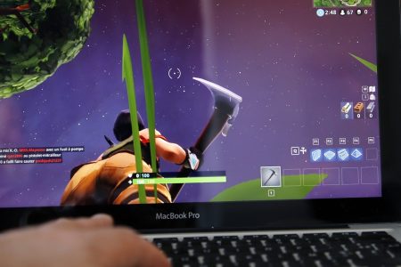 A gamer plays the video game "Fortnite: Battle Royale" developed by People Can Fly and Epic Games on May 03, 2018 in Paris, France.  (Photo by Chesnot/Getty Images)