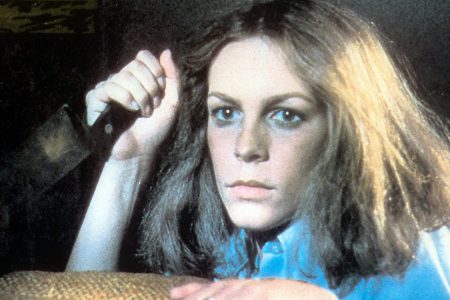 Jamie Lee Curtis holds a knife in a scene from the film 'Halloween', 1978. (Photo by Compass International Pictures/Getty Images)