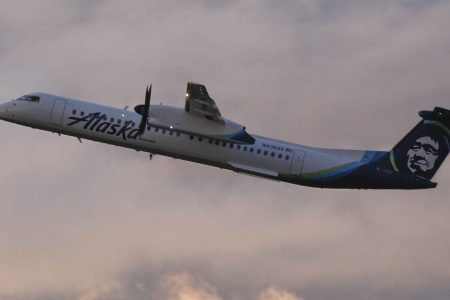 An Alaska Airlines Bombardier Dash 8 Q400 operated by Horizon Air takes off from at Seattle-Tacoma International Airport International Airport one day after Horizon Air ground crew member Richard Russell took a similar plane from the airport in Seattle, Washington on August 11, 2018.  (Photo by Jason Redmond / AFP)   