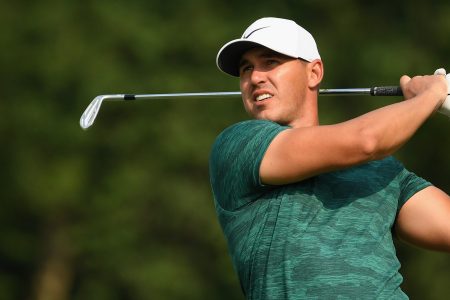 Brooks Koepka of the United States plays his shot from the 13th tee during the final round of the 2018 PGA Championship at Bellerive Country Club on August 12, 2018 in St Louis, Missouri.  (Photo by Ross Kinnaird/Getty Images)