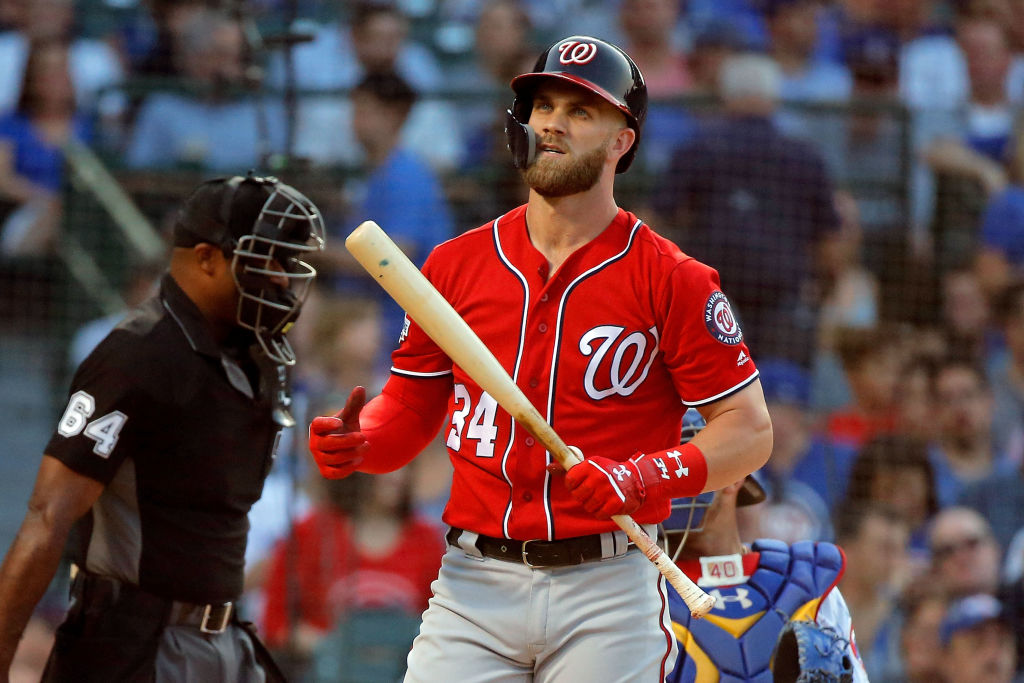 Bryce Harper #34 of the Washington Nationals reacts after a swinging strike two against the Chicago Cubs during the first inning at Wrigley Field on August 12, 2018 in Chicago, Illinois. The Chicago Cubs won 4-3. (Photo by Jon Durr/Getty Images)