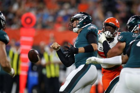CLEVELAND, OH - AUGUST 23: Philadelphia Eagles quarterback Nick Foles (9) fumbles the football during the first quarter of the National Football League preseason game between the Philadelphia Eagles and Cleveland Browns on August 23, 2018, at FirstEnergy Stadium in Cleveland, OH. Cleveland defeated Philadelphia 5-0. (Photo by Frank Jansky/Icon Sportswire via Getty Images)