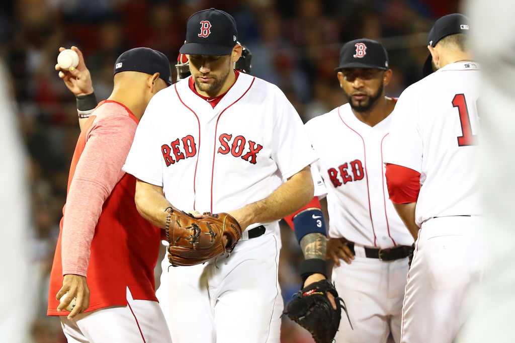 BOSTON, MA - AUGUST 21: Nathan Eovaldi #17 of the Boston Red Sox is taken out of the game by Manager Alex Cora in the sixth inning of a game against the Cleveland Indians at Fenway Park on August 21, 2018 in Boston, Massachusetts. (Photo by Adam Glanzman/Getty Images)