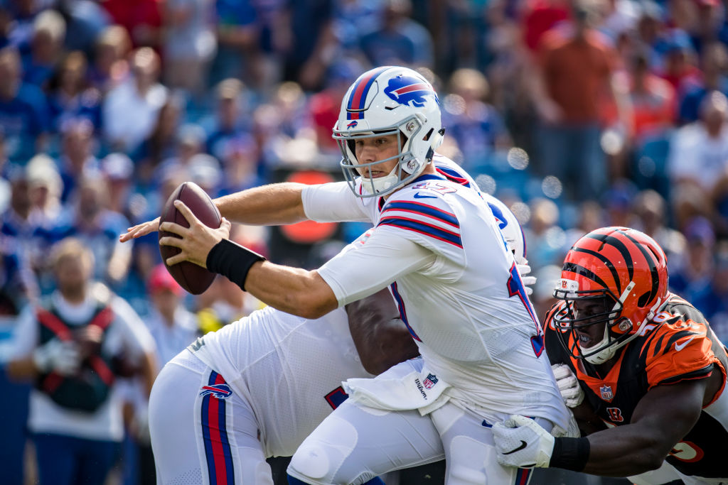 ORCHARD PARK, NY - AUGUST 26:  Josh Allen #17 of the Buffalo Bills is sacked by Carl Lawson #58 of the Cincinnati Bengals during the first quarter of a preseason game at New Era Field on August 26, 2018 in Orchard Park, New York.  (Photo by Brett Carlsen/Getty Images)