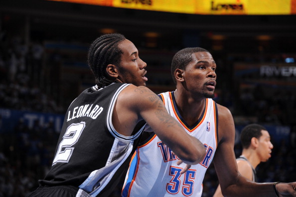 OKLAHOMA CITY, OK - JUNE 2: Kevin Durant #35 of the Oklahoma City Thunder battles for position against Kawhi Leonard #2 of the San Antonio Spurs in Game Four of the Western Conference Finals during the 2012 NBA Playoffs on June 2, 2012 at the Chesapeake Energy Arena in Oklahoma City, Oklahoma. (Photo by Andrew D. Bernstein/NBAE via Getty Images)