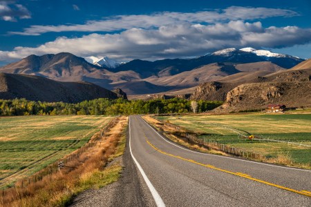 Pioneer Mountains over Round Valley, Land of the Yankee Fork, from highway near Challis, Rocky Mountains, Salmon River Scenic Byway, Idaho, USA.