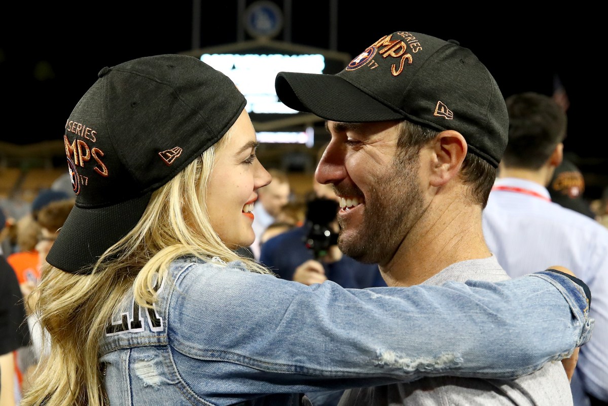 Justin Verlander #35 of the Houston Astros celebrates with fiancee Kate Upton after the Astros defeated the Los Angeles Dodgers 5-1 in game seven to win the 2017 World Series at Dodger Stadium on November 1, 2017 in Los Angeles, California.  (Photo by Ezra Shaw/Getty Images)