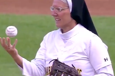 Sister Mary Jo Sobieck doing a trick before tossing out the first pitch. (NBC Sports Chicago/Twitter)