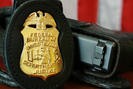 FBI badge and sidearm. (Photo: Wikimedia)