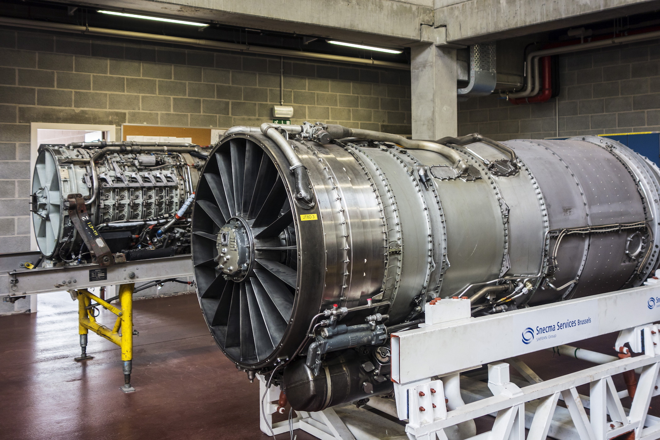 Jet engines for teaching purposes in workshop of the Vlaams Luchtvaartopleidingscentrum / VLOC / Flemish aviation training center in Ostend, Belgium. The company Magnix hopes to soon replace plane engines with an electric motor. (Photo by: Arterra/UIG via Getty Images)