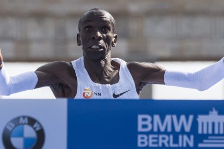 Kenya's Eliud Kipchoge sets a new marathon world record of 2:01.39 on September 16, 2018 in Berlin. (Photo credit: JOHN MACDOUGALL/AFP/Getty Images)