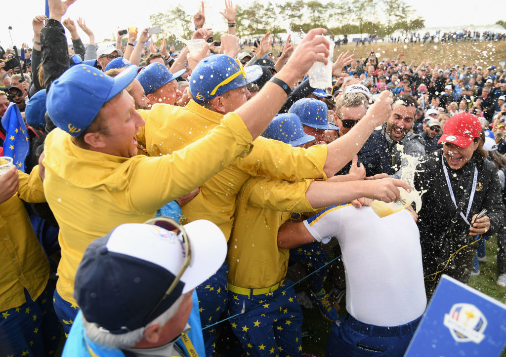 Francesco Molinari of Europe is showered with beer as he celebrates winning the Ryder Cup at Le Golf National on September 30, 2018 in Paris, France. (Photo by Ross Kinnaird/Getty Images)