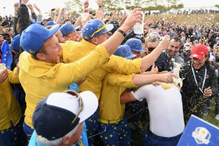 Francesco Molinari of Europe is showered with beer as he celebrates winning the Ryder Cup at Le Golf National on September 30, 2018 in Paris, France. (Photo by Ross Kinnaird/Getty Images)