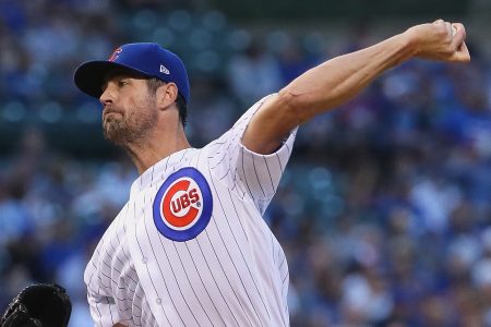 Cole Hamels #35 of the Chicago Cubs pitches on his way to a complete game win over the Cincinnati Reds at Wrigley Field on August 23, 2018 in Chicago, Illinois. (Photo by Jonathan Daniel/Getty Images)