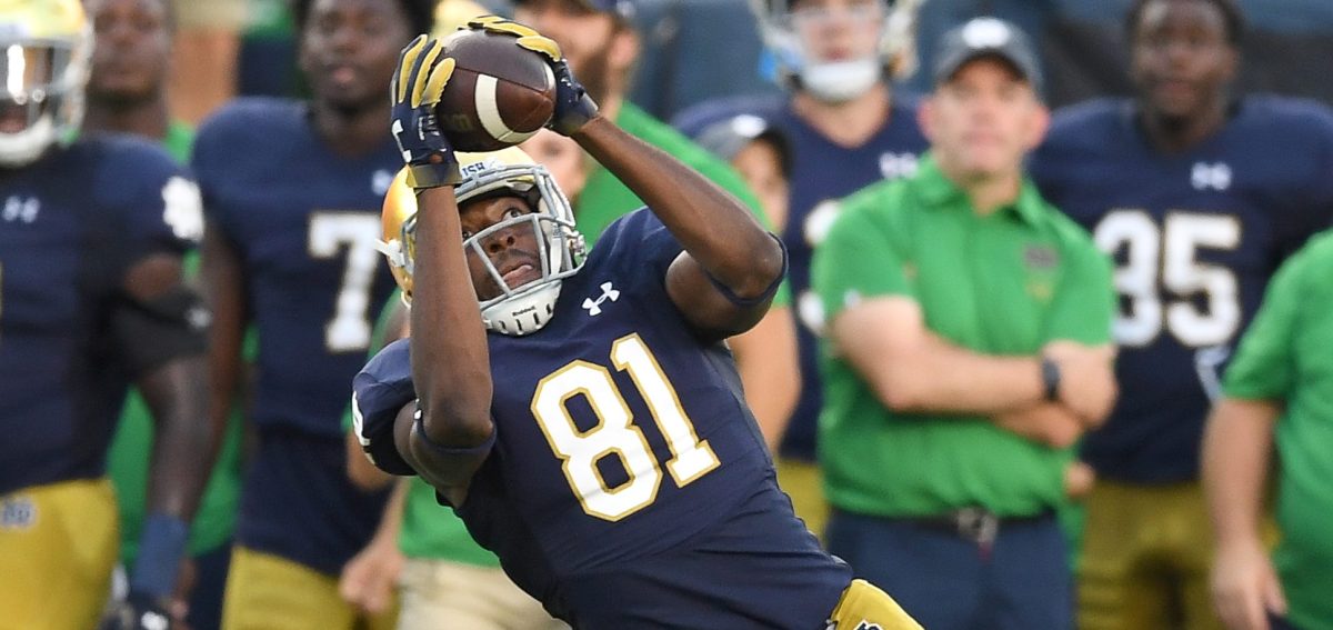 Notre Dame Fighting Irish wide receiver Miles Boykin (81) beats Michigan Wolverines defensive back Lavert Hill (24) to catch the football on September 1, 2018 at Notre Dame Stadium, in South Bend, Indiana. (Photo by Robin Alam/Icon Sportswire via Getty Images)