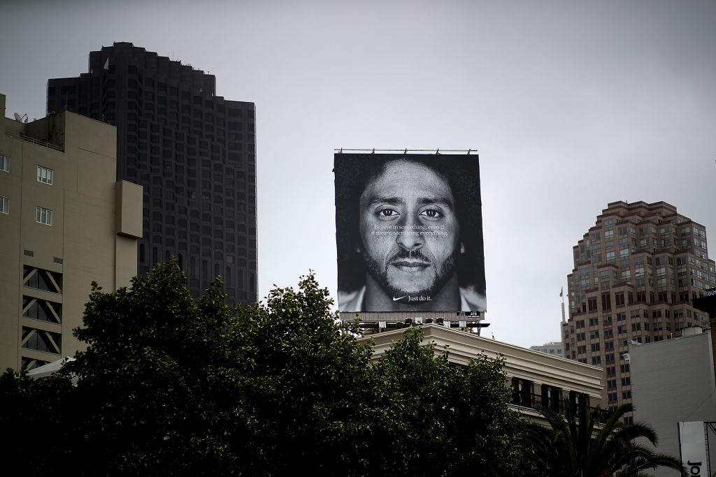 SAN FRANCISCO, CA - SEPTEMBER 05:  A billboard featuring former San Francisco 49ers quaterback Colin Kaepernick is displayed on the roof of the Nike Store on September 5, 2018 in San Francisco, California. (Photo by Justin Sullivan/Getty Images)