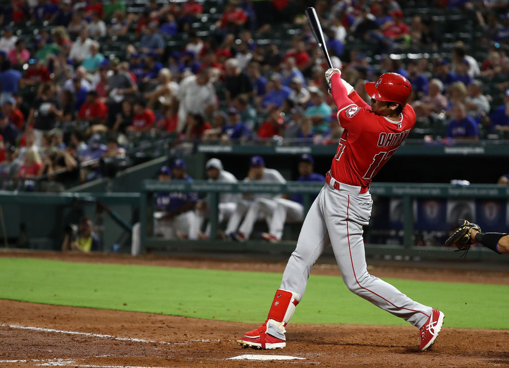ARLINGTON, TX - SEPTEMBER 05:  Shohei Ohtani #17 of the Los Angeles Angels hits a homerun against the Texas Rangers in the fifth inning at Globe Life Park in Arlington on September 5, 2018 in Arlington, Texas.  (Photo by Ronald Martinez/Getty Images)