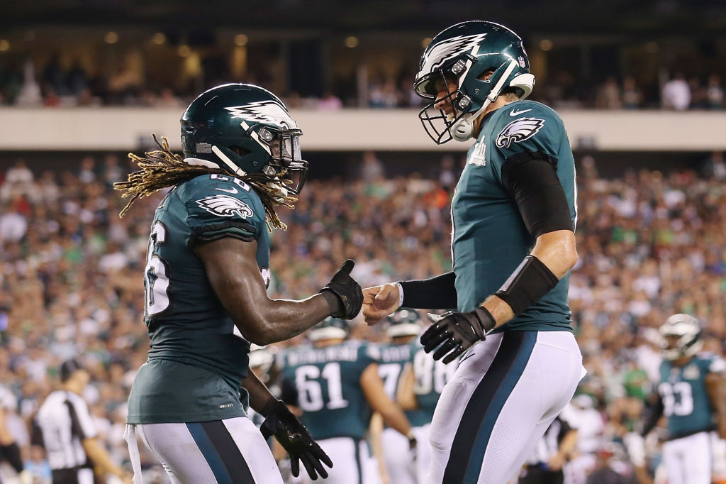 Jay Ajayi #26 of the Philadelphia Eagles celebrates with Nick Foles #9 after rushing for a 1-yard touchdown during the third quarter against the Atlanta Falcons at Lincoln Financial Field on September 6, 2018 in Philadelphia, Pennsylvania. (Photo by Mitchell Leff/Getty Images)