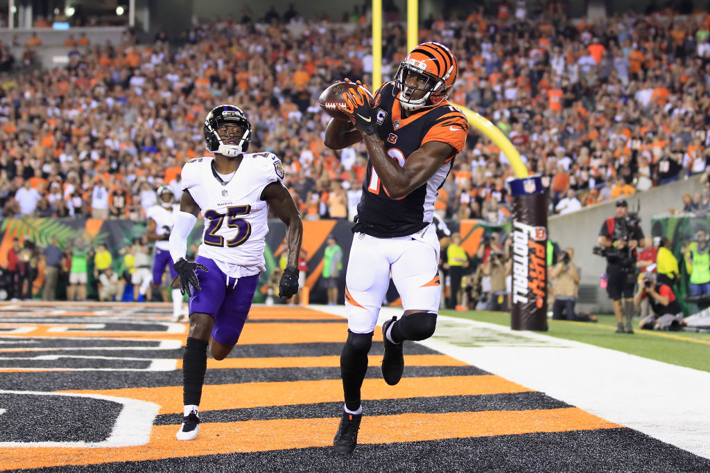 CINCINNATI, OH - SEPTEMBER 13:  A.J. Green #18 of the Cincinnati Bengals scores a touchdown against Tavon Young #25 of the Baltimore Ravens during the first quarter at Paul Brown Stadium on September 13, 2018 in Cincinnati, Ohio.  (Photo by Andy Lyons/Getty Images)
