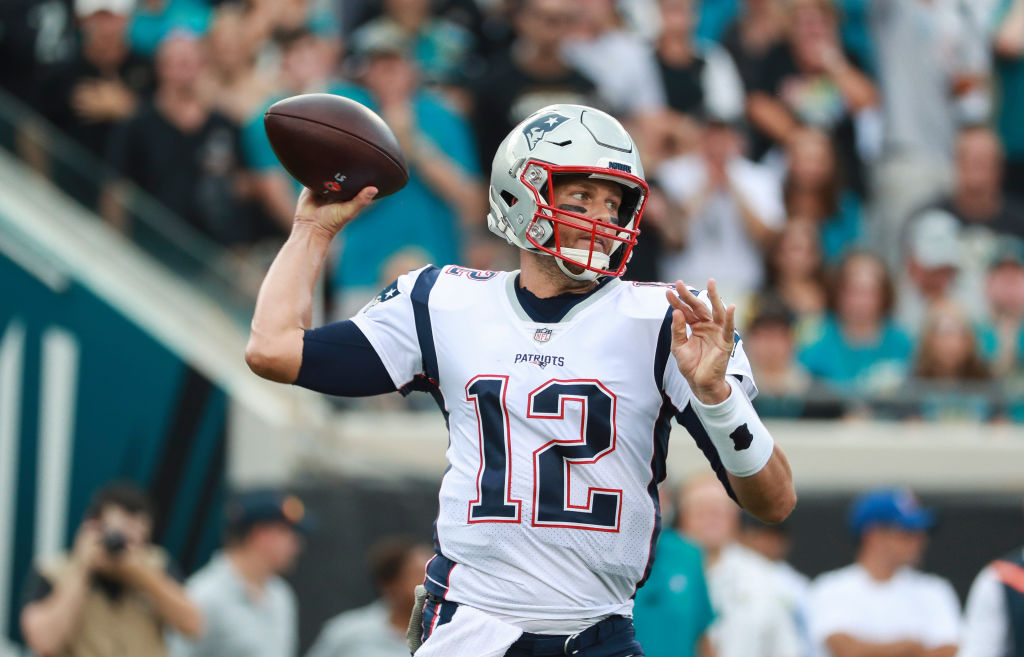 JACKSONVILLE, FL - SEPTEMBER 16: Tom Brady #12 of the New England Patriots drops back to pass against the Jacksonville Jaguars at TIAA Bank Field on September 16, 2018 in Jacksonville, Florida.  (Photo by Scott Halleran/Getty Images)
