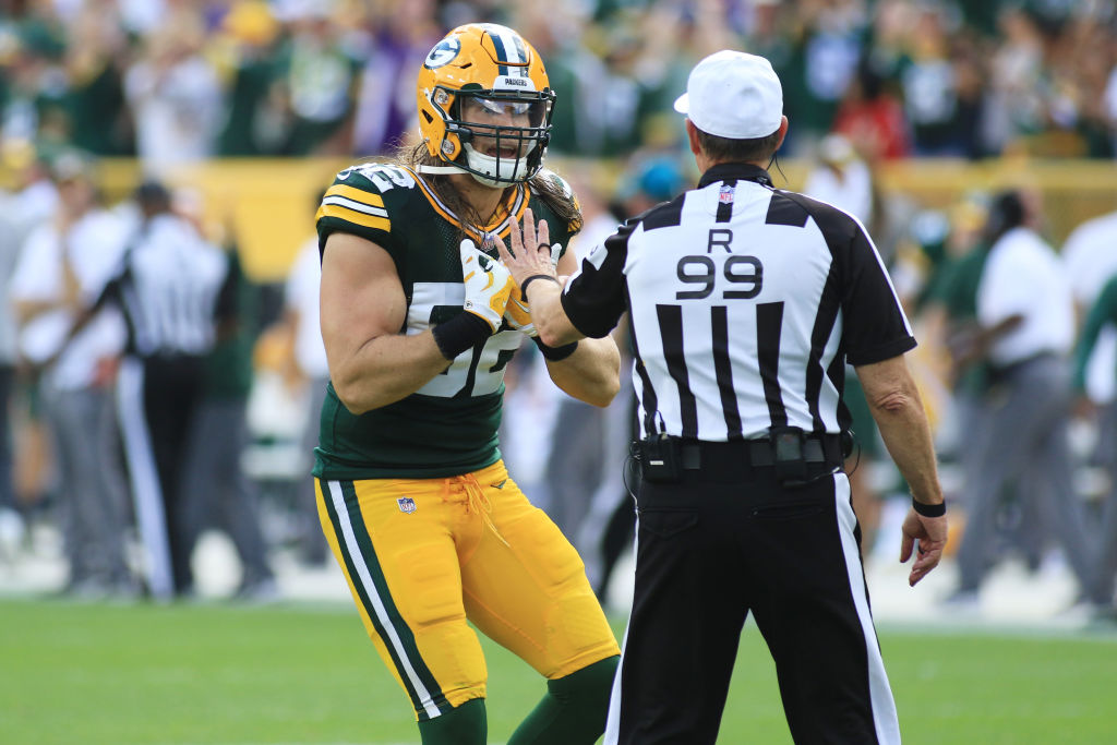 GREEN BAY, WI - SEPTEMBER 16:  Green Bay Packers linebacker Clay Matthews (52) pleads his case with referee Tony Corrente (99) during a game between the Green Bay Packers and the Minnesota Vikings at Lambeau Field on September 16, 2018 in Green Bay, WI. (Photo by Larry Radloff/Icon Sportswire via Getty Images)