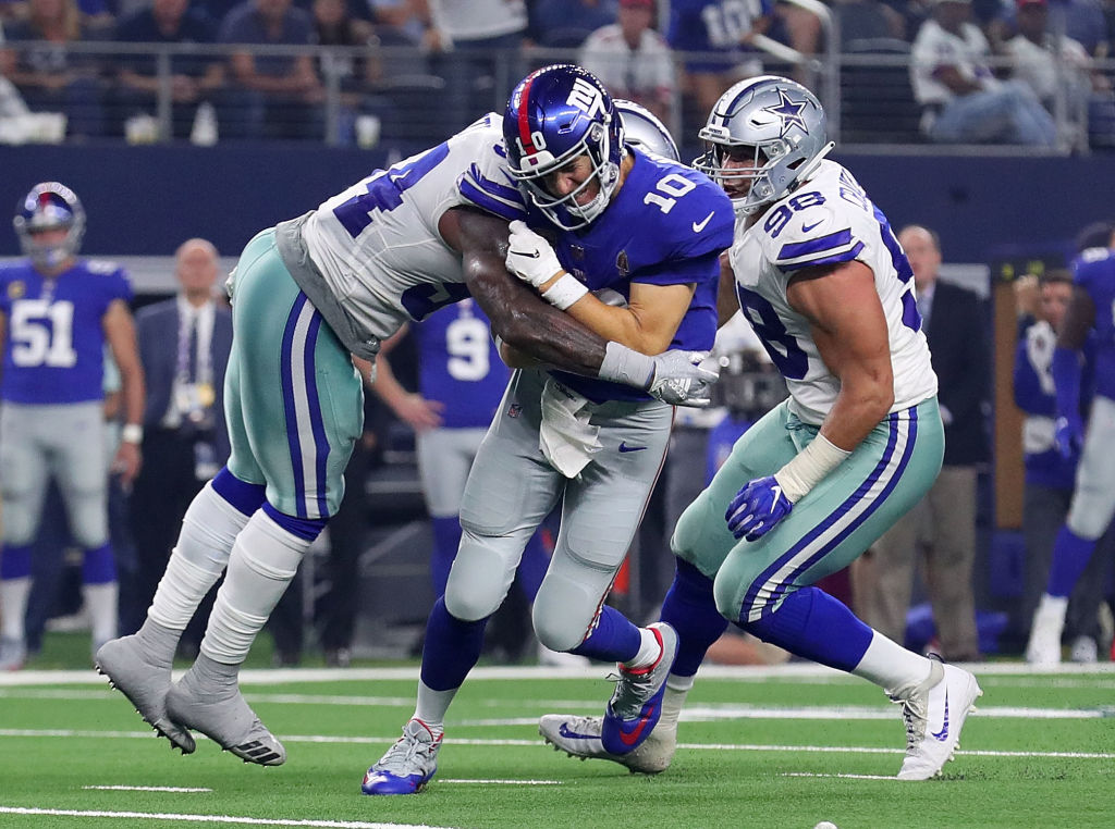 ARLINGTON, TX - SEPTEMBER 16:  Jaylon Smith #54 of the Dallas Cowboys hits Eli Manning #10 of the New York Giants in the third quarter at AT&T Stadium on September 16, 2018 in Arlington, Texas.  (Photo by Tom Pennington/Getty Images)