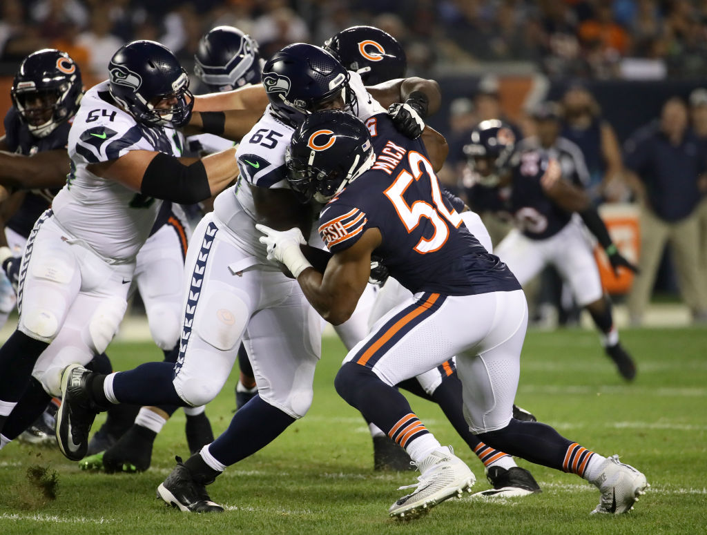 CHICAGO, IL - SEPTEMBER 17: Khalil Mack #52 of the Chicago Bears runs against Germain Ifedi #65 of the Seattle Seahawks in the first quarter at Soldier Field on September 17, 2018 in Chicago, Illinois. (Photo by Jonathan Daniel/Getty Images)
