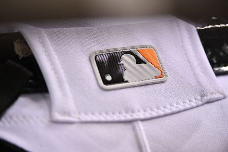 MIAMI, FL - SEPTEMBER 18: A detail view of the MLB logo on the baseball pants of Starlin Castro of the Miami Marlins during the game against the Washington Nationals at Marlins Park on September 18, 2018 in Miami, Florida. (Photo by Mark Brown/Getty Images)