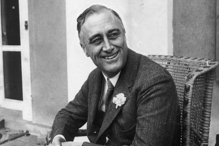 American statesman Franklin Delano Roosevelt (1882 - 1945) smiling when he heard that he was leading the contest for Governor of New York State. He later became the 32nd President of the USA.  (Photo by Hulton Archive/Getty Images)