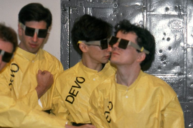 New wave group DEVO (L-R  Gerald Casale, Bob Casale, Alan Myers, Mark Mothersbaugh and Bob Mothersbaugh) poses for a portrait backstage at the Punch & Judy Theater on October 27, 1978  in Grosse Pointe Farms, Michigan. (Photo by Michael Marks/Michael Ochs Archives/Getty Images)