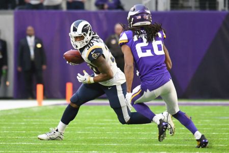 MINNEAPOLIS, MN - NOVEMBER 19: Los Angeles Rams Running Back Todd Gurley II (30) runs with the ball as Minnesota Vikings cornerback Trae Waynes (26) gives chase during a NFL game between the Minnesota Vikings and Los Angeles Rams on November 19, 2017 at U.S. Bank Stadium in Minneapolis, MN. (Photo by Nick Wosika/Icon Sportswire via Getty Images)