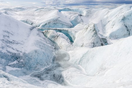 Landscape on the Greenland Ice Sheet near Kangerlussuaq. The people who monitor Greenland's ice live in extreme isolation. (Photo by: Martin Zwick/REDA&CO/UIG via Getty Images)