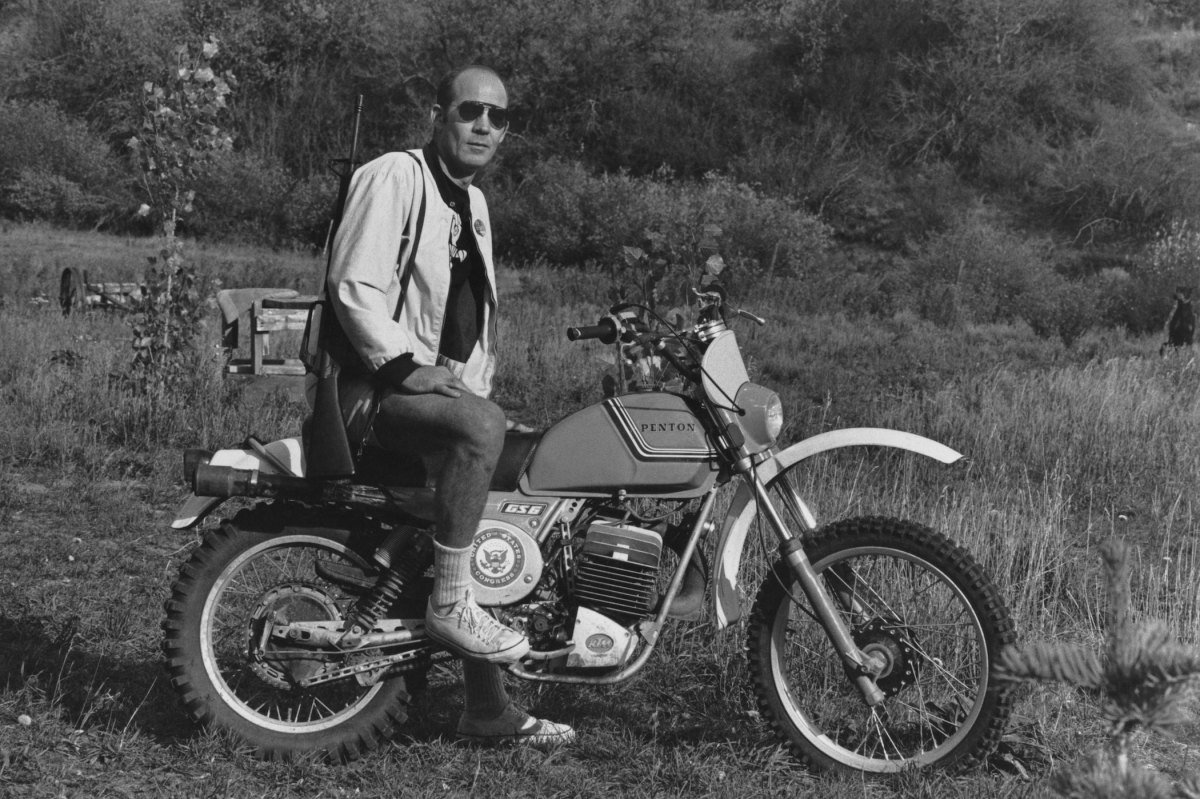 Journalist Hunter S. Thompson sits on his Penton Motor Cycle with his rifle over his shoulder on his ranch circa 1976 near Aspen Colorado. A collection of letters written by Thompson will go up for auction this week. (Photo by Michael Ochs Archives/GettyImages)