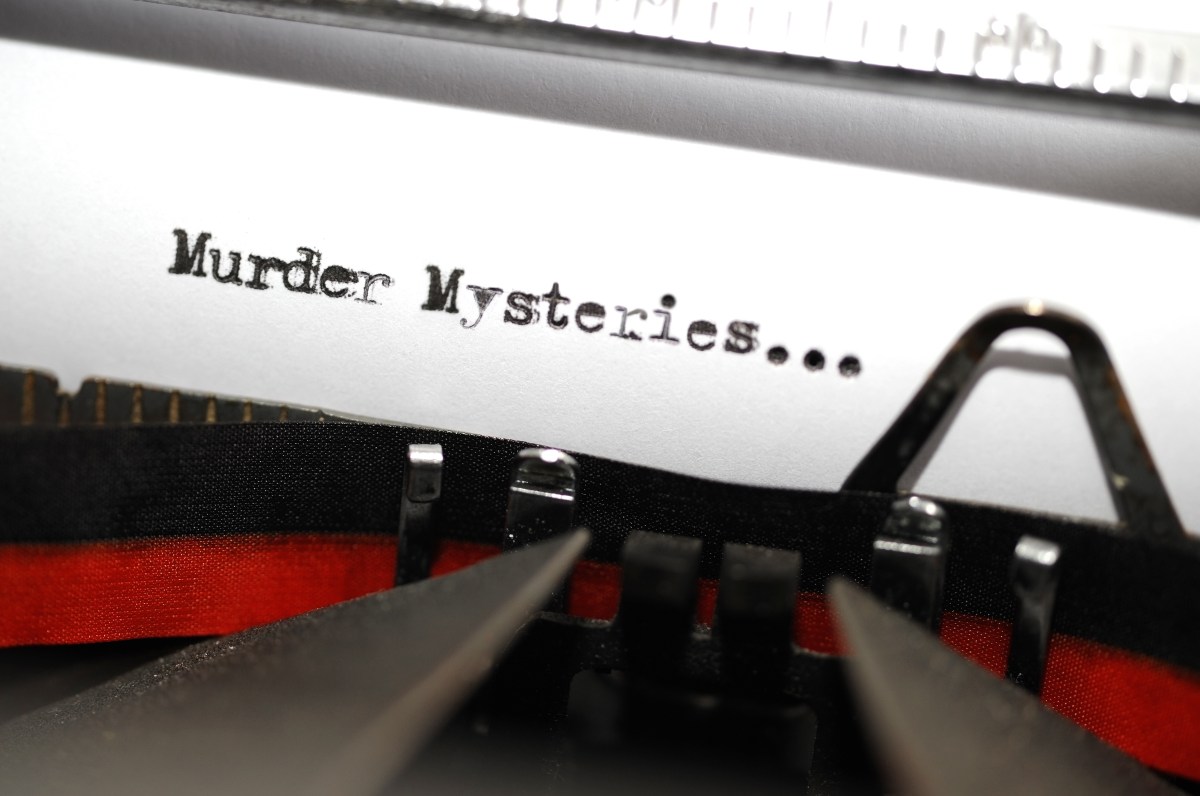 "Book Genre Series:Two words 'Murder Mysteries', intended to be a book genre, picked out on an old and very grungy typewriter. Macro image with differential focus centred on the word 'murder'."