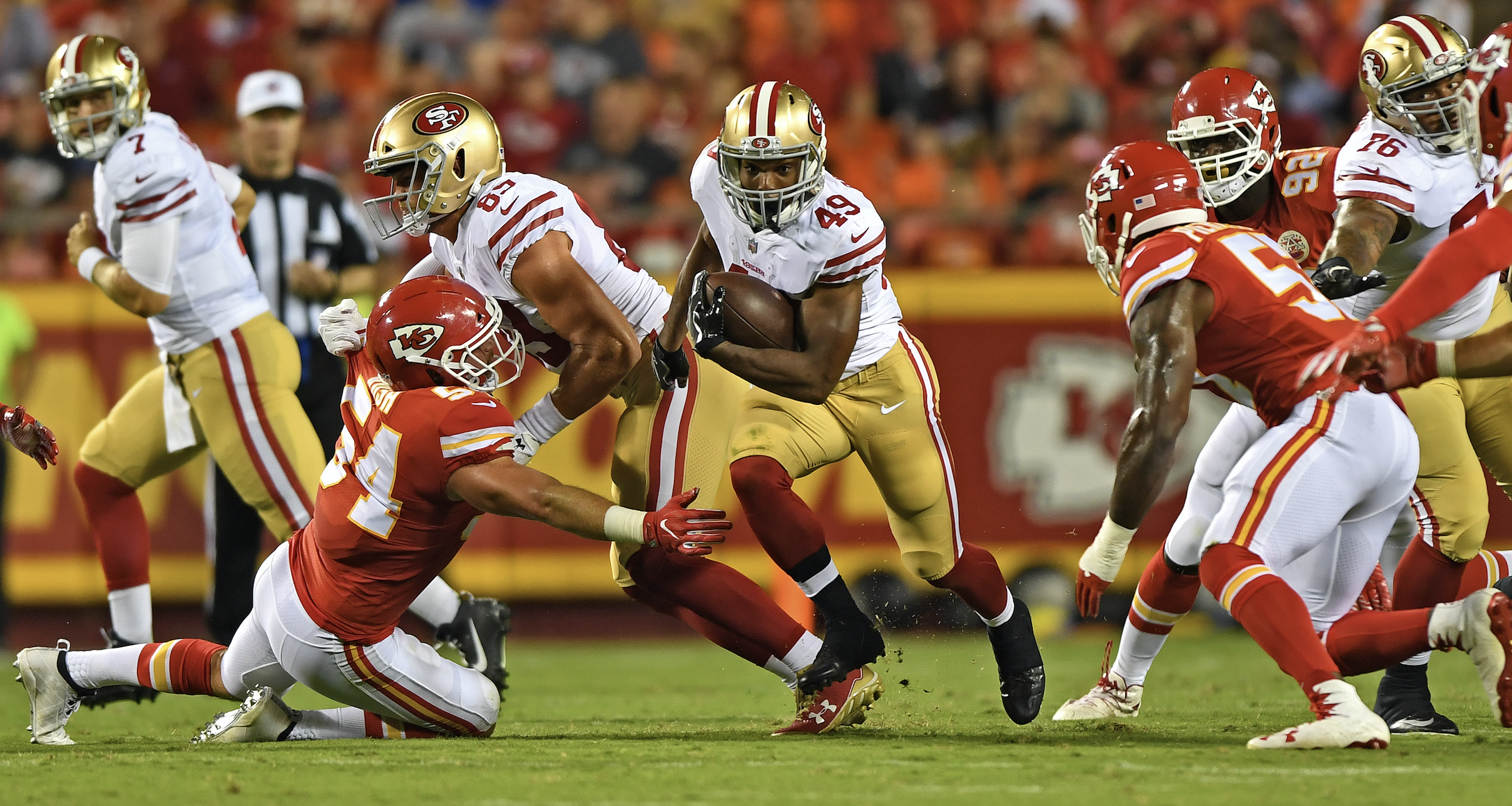 KANSAS CITY, MO - AUGUST 11: Running back Matt Breida #49 of the San Francisco 49ers rushes against the Kansas City Chiefs during the second half of a preseason game on August 11, 2017 at Arrowhead Stadium in Kansas City, Missouri. (Photo by Peter G. Aiken/Getty Images)