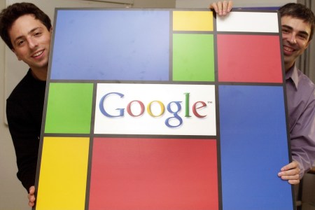 Google founders Sergey Brin (L) and Larry Page (R) pose with the company's logo. The company celebrates the 20th anniversary of its incorporation this month.  (Photo by JOKER/Martin Magunia/ullstein bild via Getty Images)