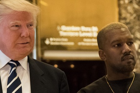 President-elect Donald Trump and Kanye West stand together in the lobby at Trump Tower, December 13, 2016 in New York City. President-elect Donald Trump and his transition team are in the process of filling cabinet and other high level positions for the new administration. (Photo by Drew Angerer/Getty Images)