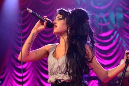 Photo of Amy Winehouse, performing live on stage. A hologram of Winehouse will soon go on tour. (Photo by C Brandon/Redferns/Getty Images)
