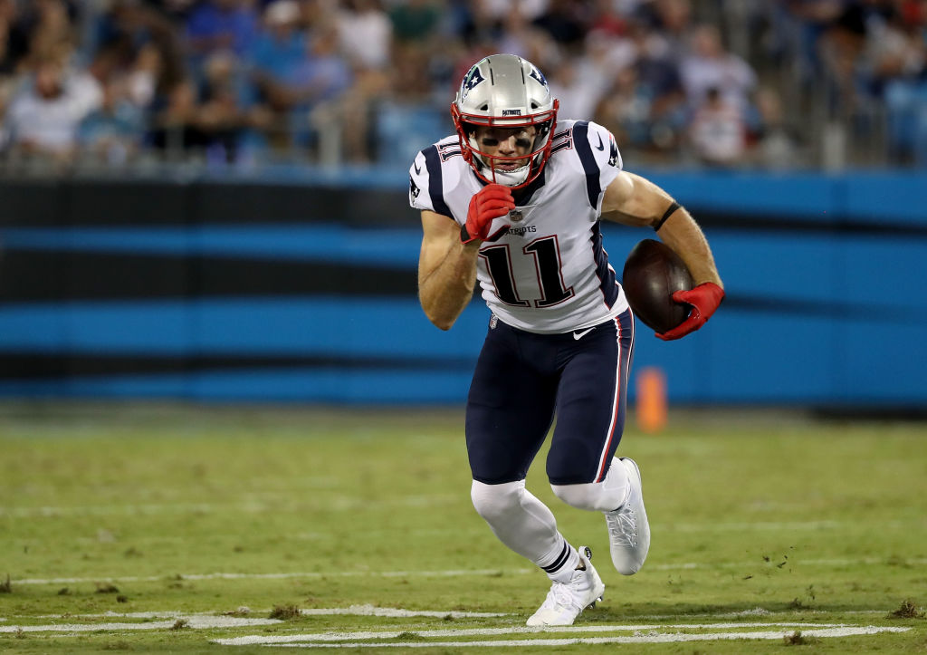 CHARLOTTE, NC - AUGUST 24:  Julian Edelman #11 of the New England Patriots runs the ball against the Carolina Panthers in the second quarter during their game at Bank of America Stadium on August 24, 2018 in Charlotte, North Carolina.  (Photo by Streeter Lecka/Getty Images)