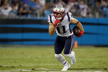 CHARLOTTE, NC - AUGUST 24:  Julian Edelman #11 of the New England Patriots runs the ball against the Carolina Panthers in the second quarter during their game at Bank of America Stadium on August 24, 2018 in Charlotte, North Carolina.  (Photo by Streeter Lecka/Getty Images)