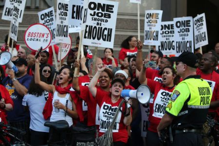 BOSTON, MA - SEPTEMBER 3: Union members picket for a new contract outside the Westin Copley in Boston on Sep. 3, 2018. Members of UNITE HERE Local 26 hotel workers held a picket line at the Westin Copley which was followed by an act of non-violent civil disobedience at the hotel. (Photo by Craig F. Walker/The Boston Globe via Getty Images)