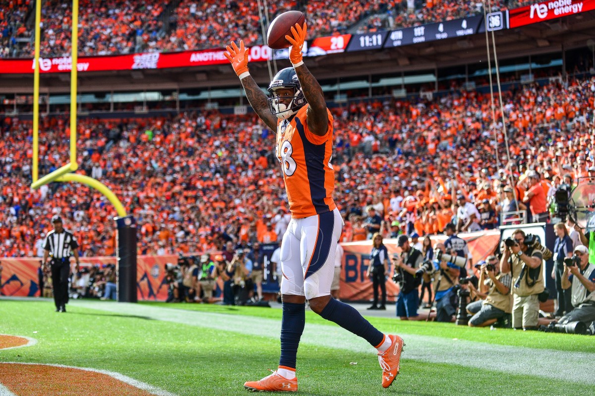 Wide receiver Demaryius Thomas #88 of the Denver Broncos celebrates after making a catch on the edge of the end zone against the Seattle Seahawks at Broncos Stadium at Mile High on September 9, 2018 in Denver, Colorado. (Photo by Dustin Bradford/Getty Images)
