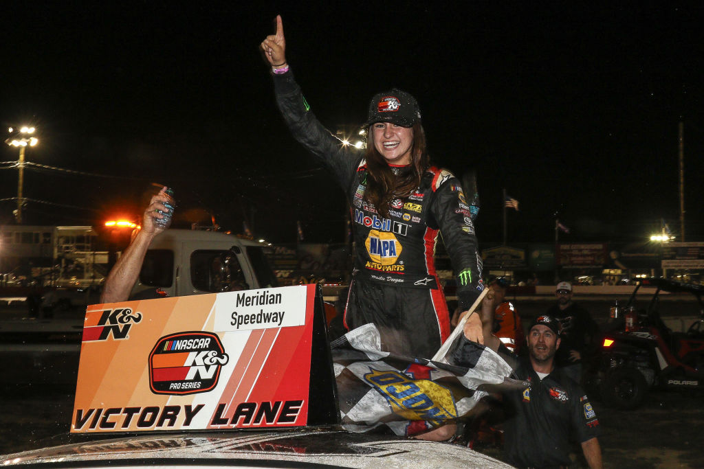 Hailie Deegan, driver of the #19 NAPA Power Premium Plus Toyota, celebrates her first victory at the conclusion of the NASCAR K&N Series West NAPA Auto Parts Idaho 208 at Meridian Speedway on September 29, 2018 in Meridian, Idaho. (Photo by Loren Orr/Getty Images for NASCAR)
