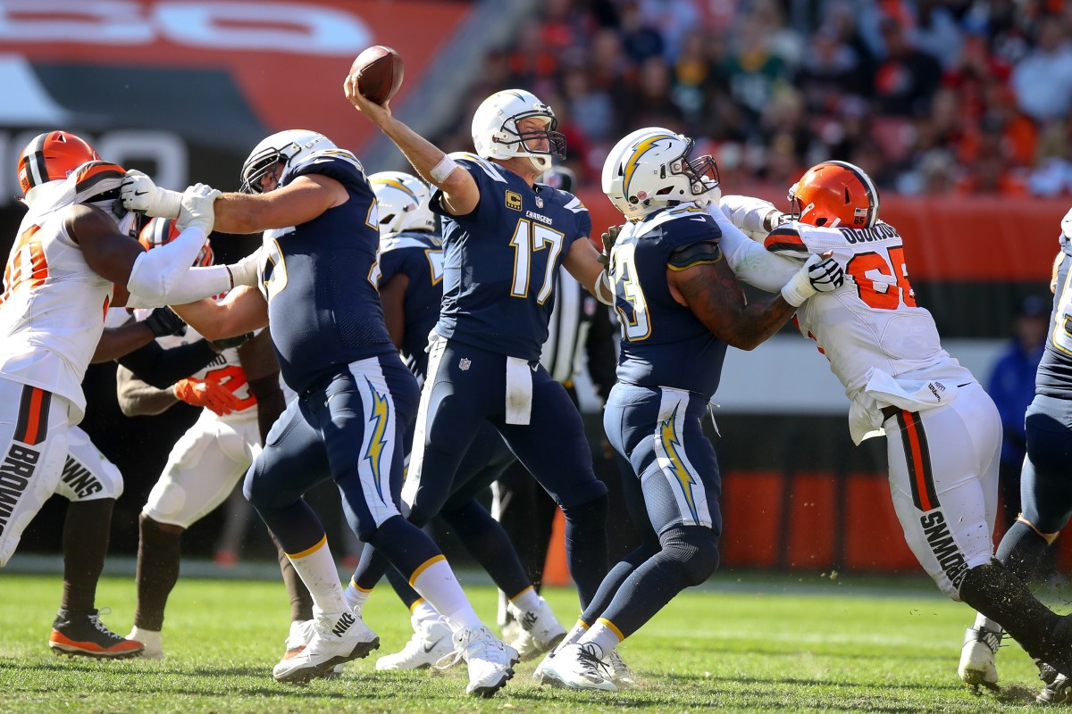 CLEVELAND, OH - OCTOBER 14: Los Angeles Chargers quarterback Philip Rivers (17) throws a pass during the third quarter of the National Football League game between the Los Angeles Chargers and Cleveland Browns on October 14, 2018, at FirstEnergy Stadium in Cleveland, OH. (Photo by Frank Jansky/Icon Sportswire via Getty Images)