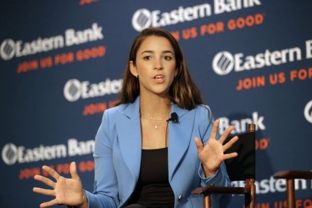 BOSTON, MA - OCTOBER 16: Olympic gymnast Aly Raisman speaks on the issue of sexual abuse at the headquarters of Eastern Bank in Boston on Oct. 16, 2018. (Photo by David L. Ryan/The Boston Globe via Getty Images)
